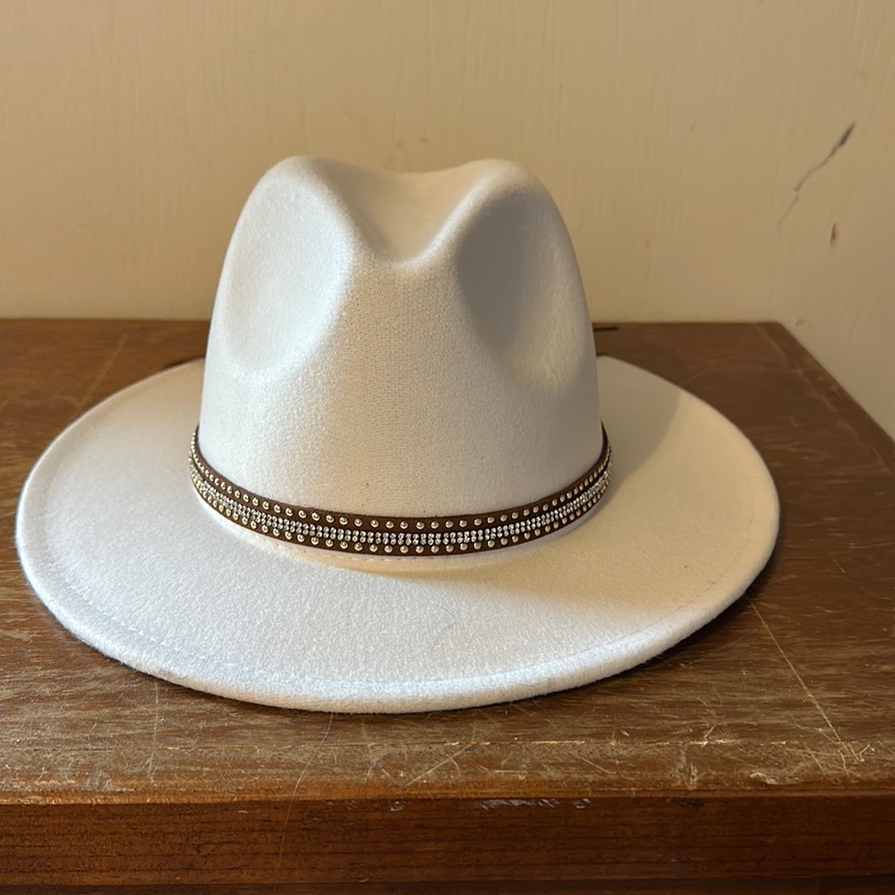 White/ cream fedora hat .